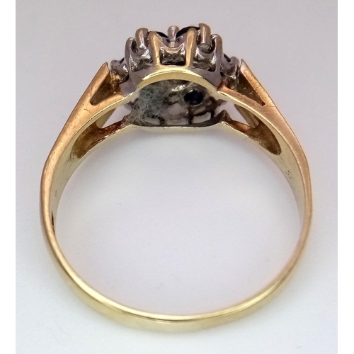 691 - A 9K YELLOW GOLD VINTAGE DIAMOND & SAPPHIRE RING, IN THE FLORAL DESIGN. 2.3G SIZE O. Ref: SC 4030