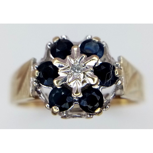 691 - A 9K YELLOW GOLD VINTAGE DIAMOND & SAPPHIRE RING, IN THE FLORAL DESIGN. 2.3G SIZE O. Ref: SC 4030