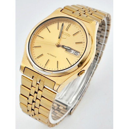 704 - Men’s Seiko 5 Gold Tone Day/Date Automatic Watch. 36mm Case. Working at time of listing.