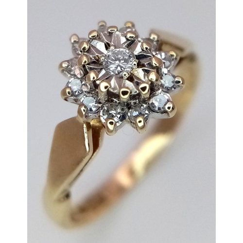 712 - A 9K YELLOW GOLD DIAMOND RING, IN THE FLORAL DESIGN. 0.15CT 2G SIZE J. Ref: SC 4044