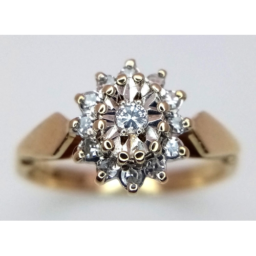 712 - A 9K YELLOW GOLD DIAMOND RING, IN THE FLORAL DESIGN. 0.15CT 2G SIZE J. Ref: SC 4044