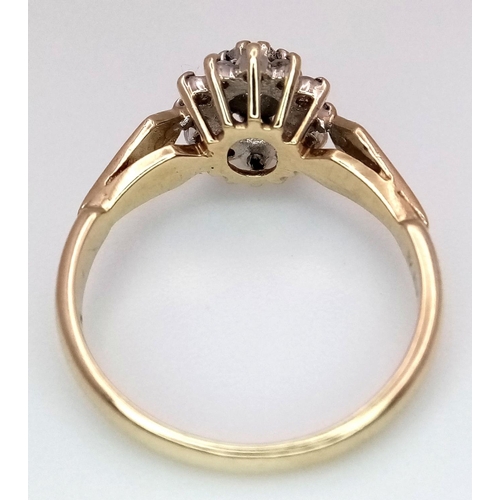 712 - A 9K YELLOW GOLD DIAMOND RING, IN THE FLORAL DESIGN. 0.15CT 2G SIZE J. Ref: SC 4044