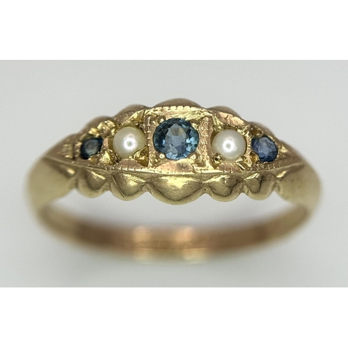 741 - A 9K YELLOW GOLD VINTAGE/ANTIQUE SAPPHIRE & PEARL RING 1.4G SIZE M. THE RING WAS RE HALLMARKED IN 19... 