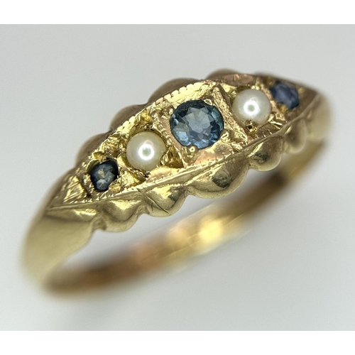 741 - A 9K YELLOW GOLD VINTAGE/ANTIQUE SAPPHIRE & PEARL RING 1.4G SIZE M. THE RING WAS RE HALLMARKED IN 19... 