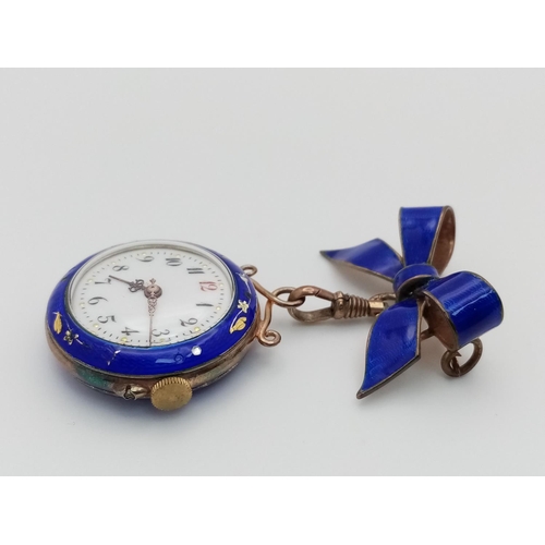 842 - An Antique Blue Enamel and Silver Brooch Pocket Watch. Hand-wind. White dial. 27mm diameter. Bow dec... 