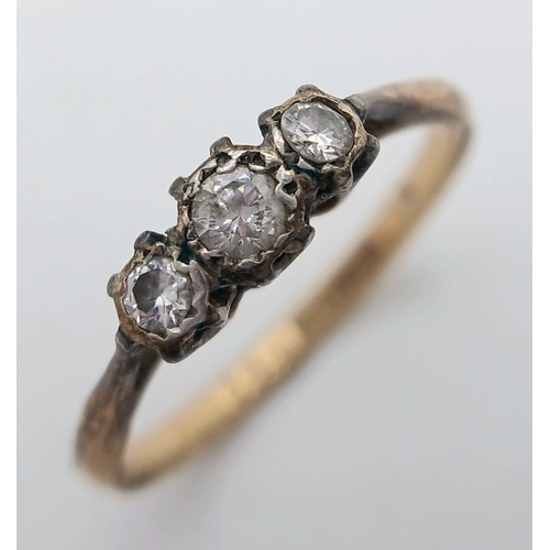 856 - An Antique 18K Yellow Gold, Platinum and Three Stone Diamond Ring. 0.25ctw. Size M. 1.9g total weigh... 