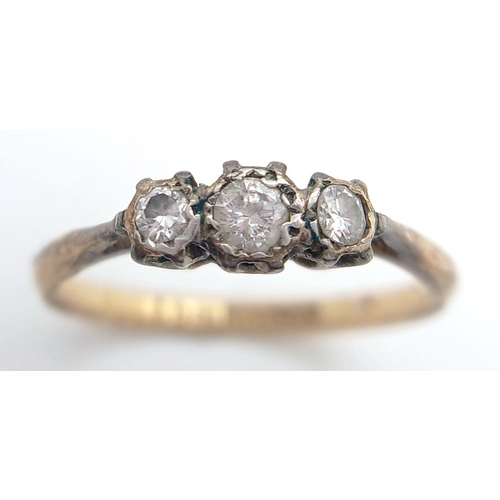 856 - An Antique 18K Yellow Gold, Platinum and Three Stone Diamond Ring. 0.25ctw. Size M. 1.9g total weigh... 