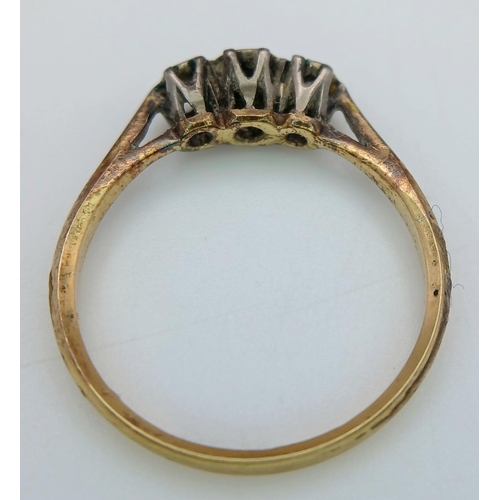 856 - An Antique 18K Yellow Gold, Platinum and Three Stone Diamond Ring. 0.25ctw. Size M. 1.9g total weigh... 