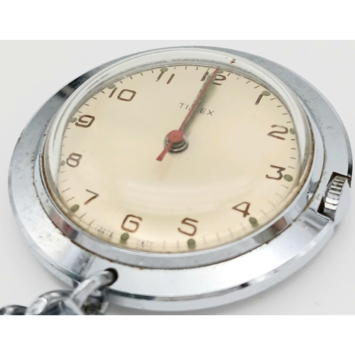 1002 - A Vintage Timex Hand-Wind Brooch Watch. In working order.
35mm case.