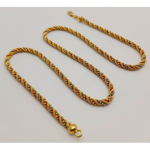 111 - An 18K Yellow and White Gold Rope-Twist Design Necklace. 
44cm. 13.3g weight.