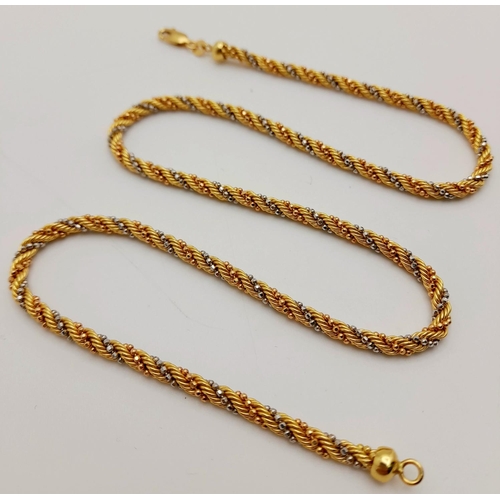 111 - An 18K Yellow and White Gold Rope-Twist Design Necklace. 
44cm. 13.3g weight.