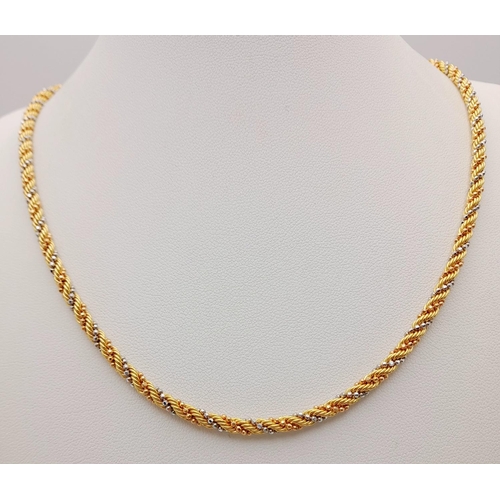 111 - An 18K Yellow and White Gold Rope-Twist Design Necklace. 
44cm. 13.3g weight.