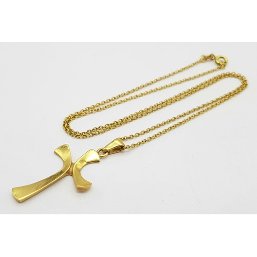 128 - An 18K Yellow Gold Cross Pendant on an 18K Gold Necklace. 
4cm. 48cm length. 6.25g total weight.