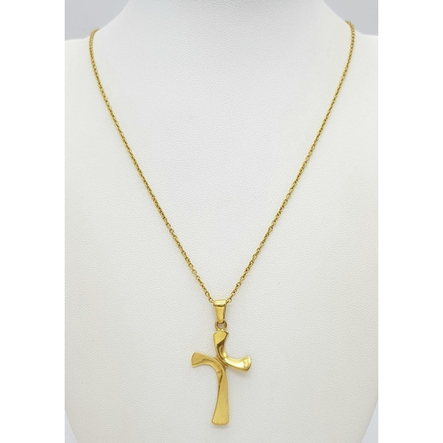 128 - An 18K Yellow Gold Cross Pendant on an 18K Gold Necklace. 
4cm. 48cm length. 6.25g total weight.