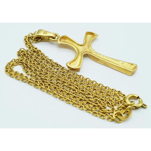 128 - An 18K Yellow Gold Cross Pendant on an 18K Gold Necklace. 
4cm. 48cm length. 6.25g total weight.