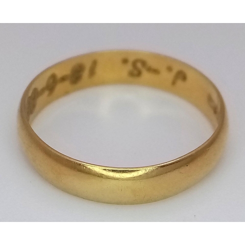 213 - An 18k Yellow Gold Band Ring. 4mm width. Size L 1/2. 1.9g weight.