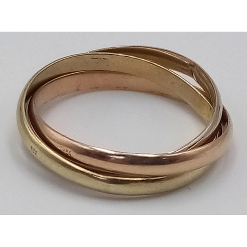 379 - An 18K Tri-Colour Gold Band Ring. Size N 1/2. 3.9g total weight.