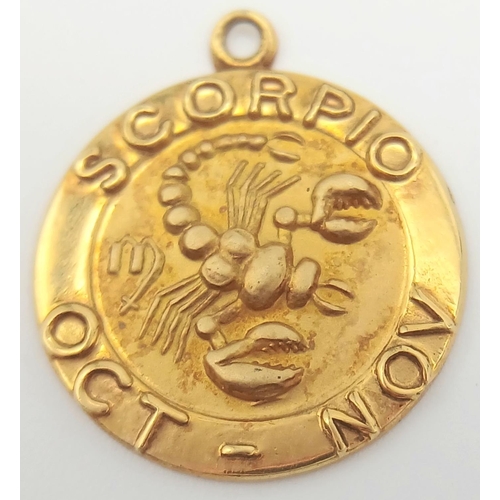 562 - A 9K Yellow Gold Scorpio Pendant. 15mm. 1.6g.