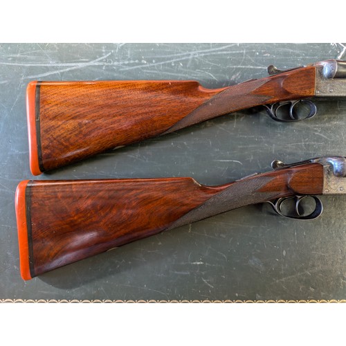 2 - A very rare pair of side by side 12 bore shotguns  - by Harrods. Serial numbers 2004 and 2005. Barre... 