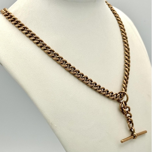 15 - A Classic Antique 9K Rose Gold Albert Chain with T Bar. 44cm. 60.9g weight.