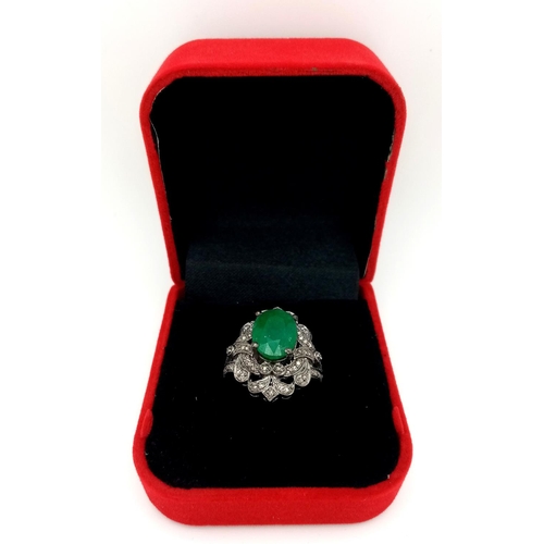 402 - An Art Deco Style 4.75ct Emerald Gemstone Ring with 0.70ctw of Diamond Accents. Set in 925 Silver. S... 