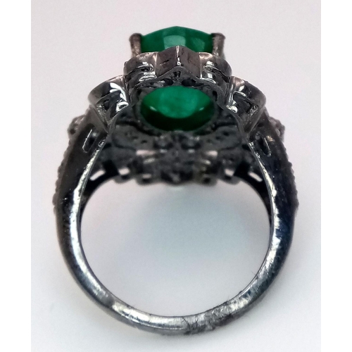 402 - An Art Deco Style 4.75ct Emerald Gemstone Ring with 0.70ctw of Diamond Accents. Set in 925 Silver. S... 