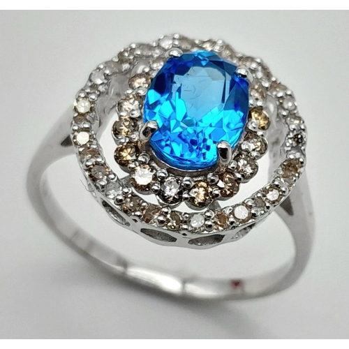 442 - A 1.2ct Blue Topaz Ring with 0.52ctw of Diamond Accents. Set in 925 Silver. Size Q. Ref: CD-1512