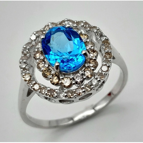 442 - A 1.2ct Blue Topaz Ring with 0.52ctw of Diamond Accents. Set in 925 Silver. Size Q. Ref: CD-1512