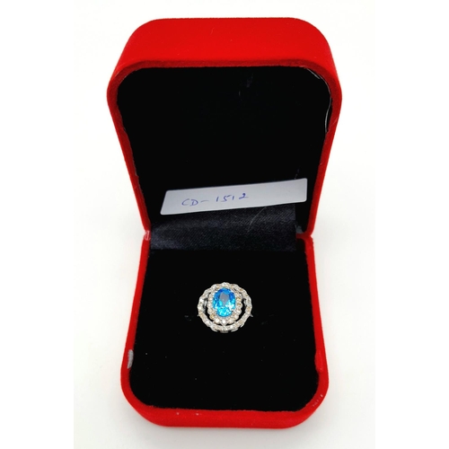 442 - A 1.2ct Blue Topaz Ring with 0.52ctw of Diamond Accents. Set in 925 Silver. Size Q. Ref: CD-1512