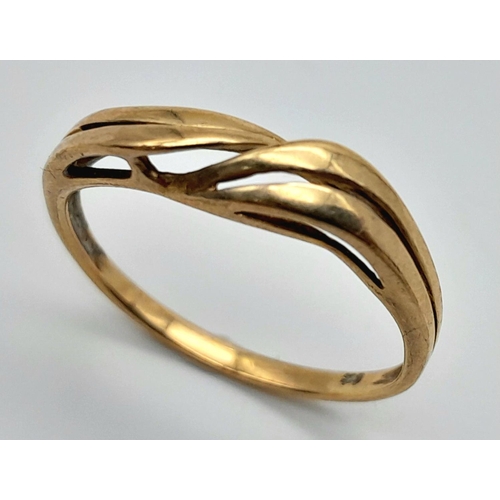 522 - A 9K Yellow Gold Crossover Ring. Size N. 1.4g.