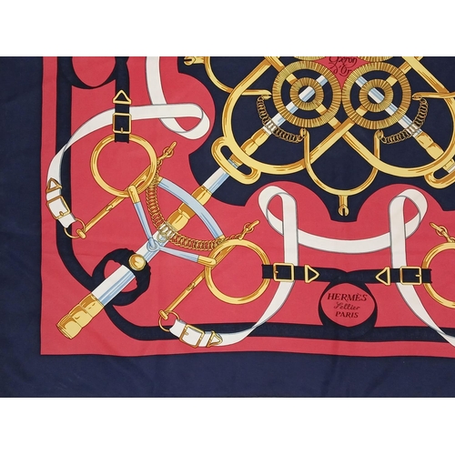 689 - A Hermes Silk Scarf with Four Sword Pattern. 90cm x 90cm. 
Ref: 019338.