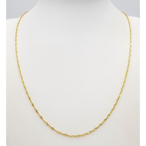 72 - An Italian 9K Yellow Gold Petit Curb Link Necklace. 44cm. 1.85g weight.