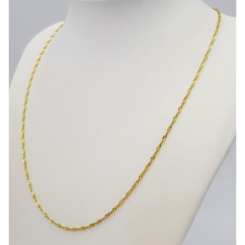 72 - An Italian 9K Yellow Gold Petit Curb Link Necklace. 44cm. 1.85g weight.