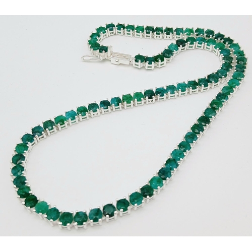 184 - An Emerald Gemstone Tennis Necklace. Set in 925 Silver. 44cm length. Ref: CD-1513