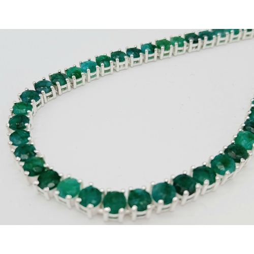 184 - An Emerald Gemstone Tennis Necklace. Set in 925 Silver. 44cm length. Ref: CD-1513