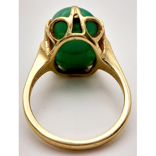 203 - Stunning 14 carat GOLD and JADE RING. Consisting a large polished JADE GEMSTONE set to top in attrac... 