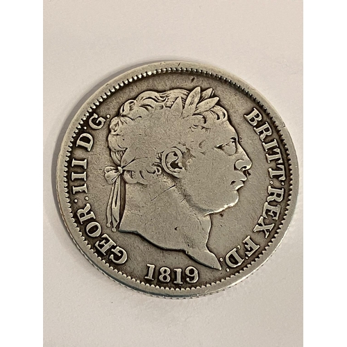 210 - 1819 GEORGE III SILVER SHILLING. Bullhead with Bust. About Very fine condition.