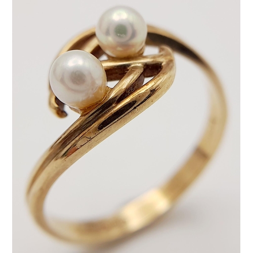 224 - 9 carat GOLD, DOUBLE PEARL RING. Having 2 x Pearls mounted to top in an attractive double scroll set... 