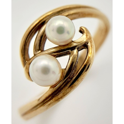 224 - 9 carat GOLD, DOUBLE PEARL RING. Having 2 x Pearls mounted to top in an attractive double scroll set... 