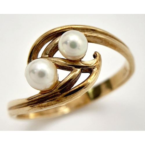 224 - 9 carat GOLD, DOUBLE PEARL RING. Having 2 x Pearls mounted to top in an attractive double scroll set... 