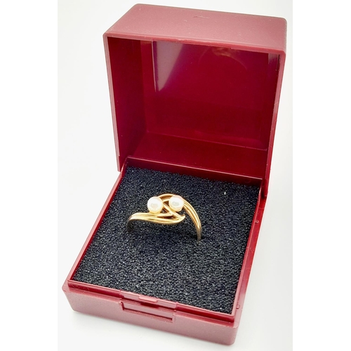 224 - 9 carat GOLD, DOUBLE PEARL RING. Having 2 x Pearls mounted to top in an attractive double scroll set... 