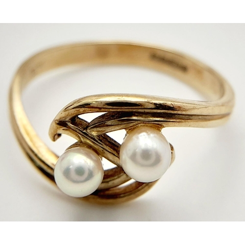 224 - 9 carat GOLD, DOUBLE PEARL RING. Having 2 x Pearls mounted to top in an attractive double scroll set... 