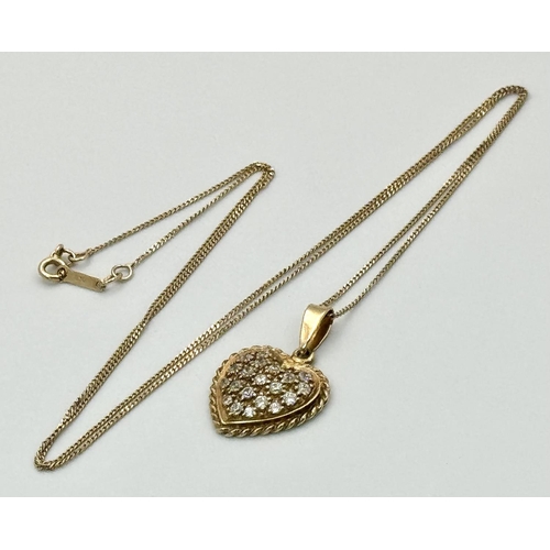 231 - Extremely Pretty 9 carat GOLD HEART PENDANT set with Crystals and mounted on a fine 9 carat GOLD CHA... 