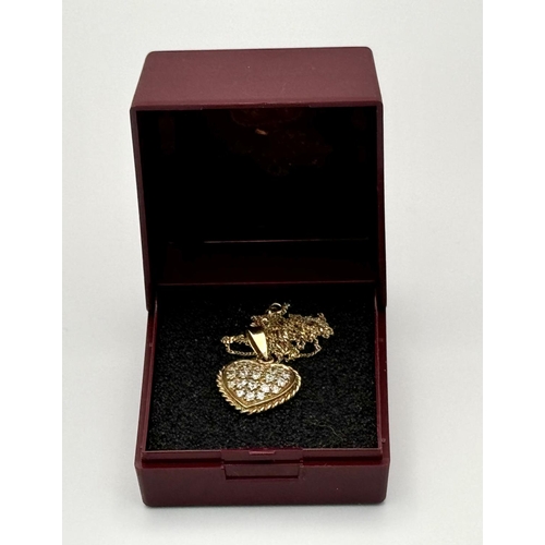 231 - Extremely Pretty 9 carat GOLD HEART PENDANT set with Crystals and mounted on a fine 9 carat GOLD CHA... 