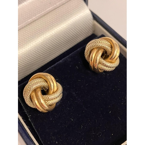 259 - Classic pair of 9 CARAT WHITE & YELLOW GOLD, CHUNKY KNOT EARRINGS. complete with GOLD BACKS. Present... 