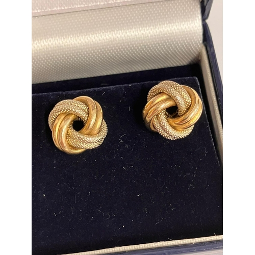 259 - Classic pair of 9 CARAT WHITE & YELLOW GOLD, CHUNKY KNOT EARRINGS. complete with GOLD BACKS. Present... 