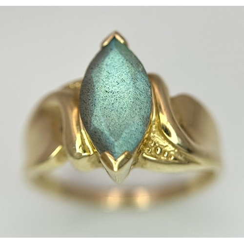 280 - 9 carat GOLD RING with pale blue Mystic GOLDSTONE SOLITAIRE Set to top. Marquise Cut.  Full UK hallm... 