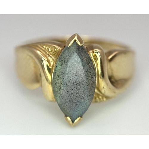 280 - 9 carat GOLD RING with pale blue Mystic GOLDSTONE SOLITAIRE Set to top. Marquise Cut.  Full UK hallm... 