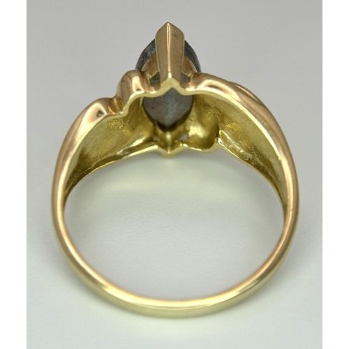 280 - 9 carat GOLD RING with pale blue Mystic GOLDSTONE SOLITAIRE Set to top. Marquise Cut.  Full UK hallm... 