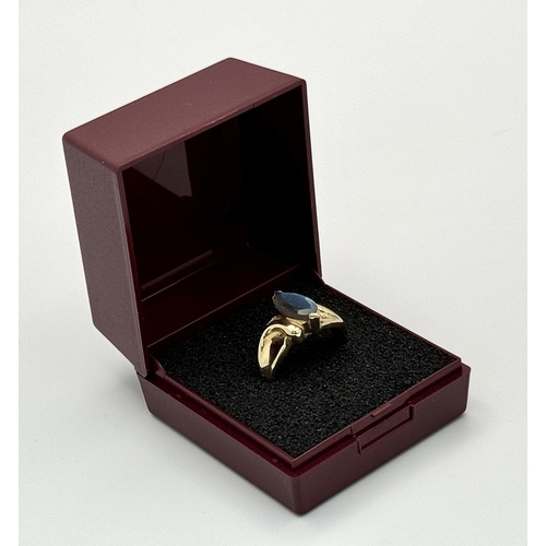 280 - 9 carat GOLD RING with pale blue Mystic GOLDSTONE SOLITAIRE Set to top. Marquise Cut.  Full UK hallm... 